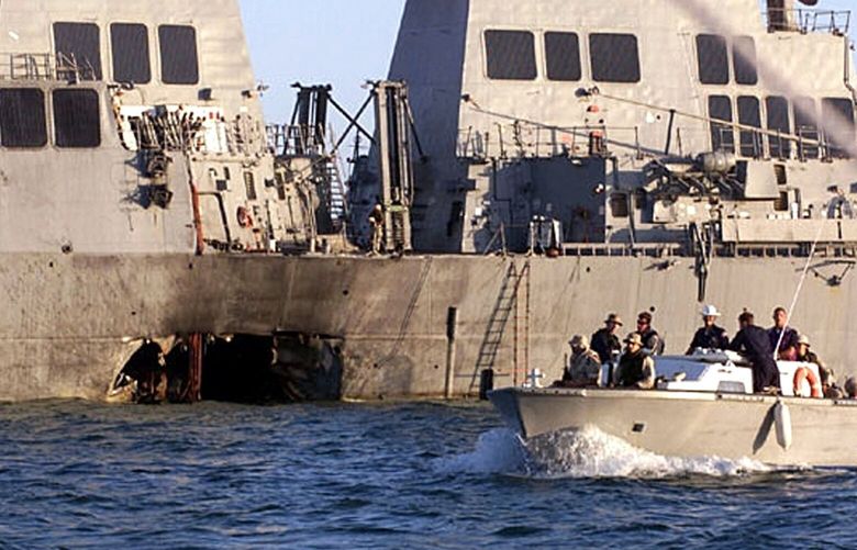 FILE — An Oct. 18, 2000 photo provided by the U.S. Navy shows damage to the USS Cole after the suicide bombing attack in the harbor at Aden, Yemen six days earlier. (Lyle G. Becker/U.S. Navy via The New York Times) — NO SALES; EDITORIAL USE ONLY —  XNYT0939 XNYT0939