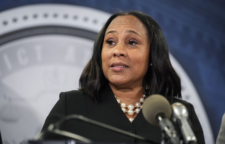Fulton County District Attorney Fani Willis speaks in the Fulton County Government Center during a news conference, Monday, Aug. 14, 2023, in Atlanta. Donald Trump and several allies have been indicted in Georgia over efforts to overturn his 2020 election loss in the state. (AP Photo/John Bazemore) GAMS131 GAMS131