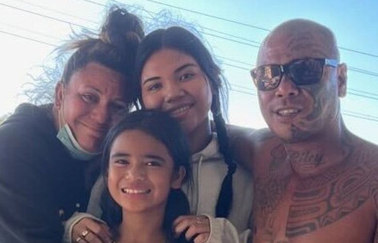 Shaun “Buge” Saribay and Twyla Kukahiko with their daughters Clara, center, and Riley a day after they were separated. “A house can be replaced,” Saribay said. “My family, myself, my ohana, you cannot replace that.” MUST CREDIT: Family photo