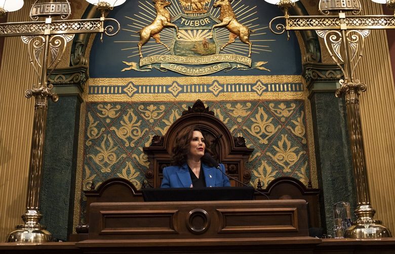 FILE – Michigan Gov. Gretchen Whitmer delivers the State of the State address at the Michigan State Capitol in Lansing, Mich., Jan. 25, 2023. Three men accused of helping to surveil Whitmer’s vacation home could face more than 20 years in prison if convicted. (Emily Elconin/The New York Times) XNYT0727 XNYT0727