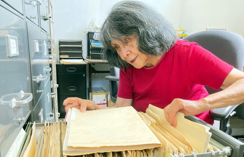 To locate a 1983 oral-history transcript of 1930s Alaskan cannery worker and union leader Antonio Rodrigo, Dorothy Cordova digs into a file cabinet.