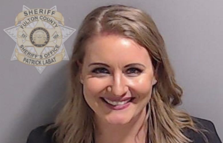 This booking photo provided by the Fulton County Sheriff’s Office shows Jenna Ellis on Wednesday, Aug. 23, 2023, in Atlanta, after she surrendered and was booked. Ellis is charged alongside former President Donald Trump and 17 others, who are accused by Fulton County District Attorney Fani Willis of scheming to subvert the will of Georgia voters to keep the Republican president in the White House after he lost to Democrat Joe Biden. (Fulton County Sheriff’s Office via AP) GAJE208 GAJE208