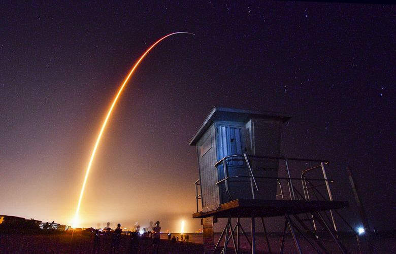 A SpaceX Falcon 9 rocket with the Crew Dragon spacecraft with astronauts on a mission to the International Space Station lifts off from pad 39A at Kennedy Space Center in Cape Canaveral, Fla., seen in Rockledge, Fla., Saturday, Aug. 26, 2023. (Malcolm Denemark/Florida Today via AP) 