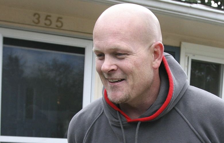 FILE – Joe Wurzelbacher, also known as “Joe the Plumber,” laughs while talking outside of his home in Holland, Ohio, Oct. 16, 2008. Wurzelbacher, who was thrust into the political spotlight as “Joe the Plumber” after questioning Barack Obama about his economic policies during the 2008 presidential campaign, has died, his son said Monday, Aug. 28, 2023. He was 49. His oldest son, Joey Wurzelbacher, said his father died Sunday, Aug. 27, in Wisconsin after a long illness. (AP Photo/Madalyn Ruggiero, File) NYSS106 NYSS106