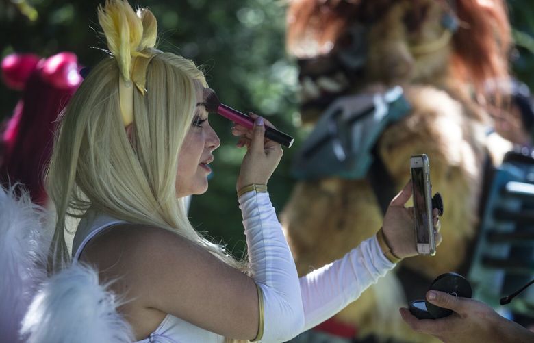 Saturday, Sept. 2, 2017.  Jade Marie of Puyallup puts on makeup to help combat sweating in her Star Guardian character costume named Ahri.  Sheâ€™s wearing a new â€œSkinâ€ thatâ€™s only been seen for a month so sheâ€™s an original at the Pax West gaming festival being held at the Washington State Convention Center.  203406