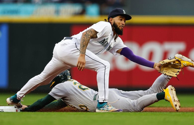The throw to J.P. Crawford isn’t in time to catch the stealing Zack Gelof in the first ininng.  The Oakland Athletics played the Seattle Mariners Monday, August 28, 2023 at T-Mobile Park, in Seattle, WA. 224819