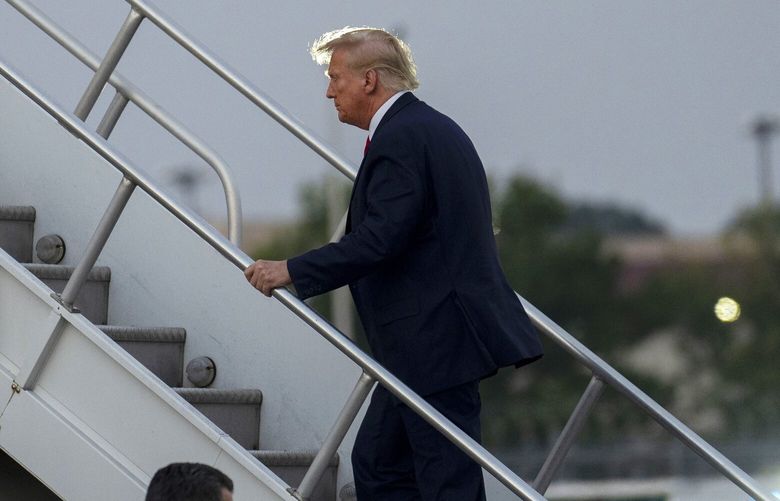 Former President Donald Trump boards his private plane at the Hartsfield-Jackson International Airport in Atlanta, on Aug 24, 2023. Trump is looking to challenge the March 4 start date for his federal trial. (Doug Mills/The New York Times) XNYT0261 XNYT0261