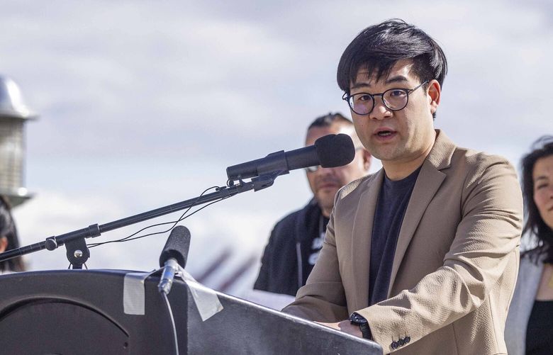 Port of Seattle Commissioner Sam Cho addresses the crowd during an opening ceremony and preview event  for the new Elliott Way bridge on Monday on April 24, 2023. The event unveiled the honorary street sign Dzidzilalich.