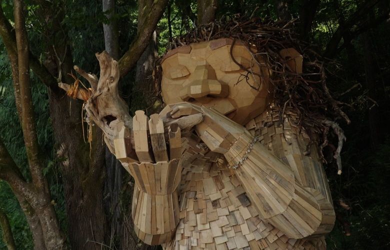 In a most unexpected way, Coast Salish culture and art has collided with Danish folklore on the shores of Lincoln Park – in the form of a giant troll. As part of Danish environmental artist Thomas Dambo’s “Northwest Trolls: Way of the Bird King” exhibition, Muckleshoot artist Coyote contributed to the story and design of the troll Bruun Idun and adorned her with traditional cedar and abalone shells.