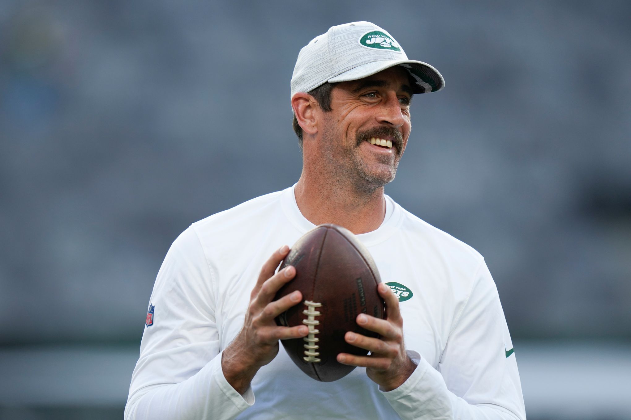 Put off by his off-season vision quests, fans hold Aaron Rodgers