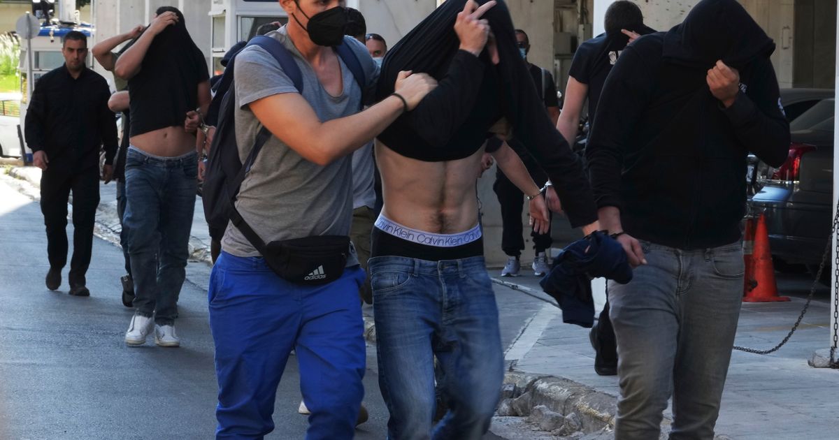 Nearly 100 Croatian soccer fans face murder, gangrelated charges in Greece after deadly