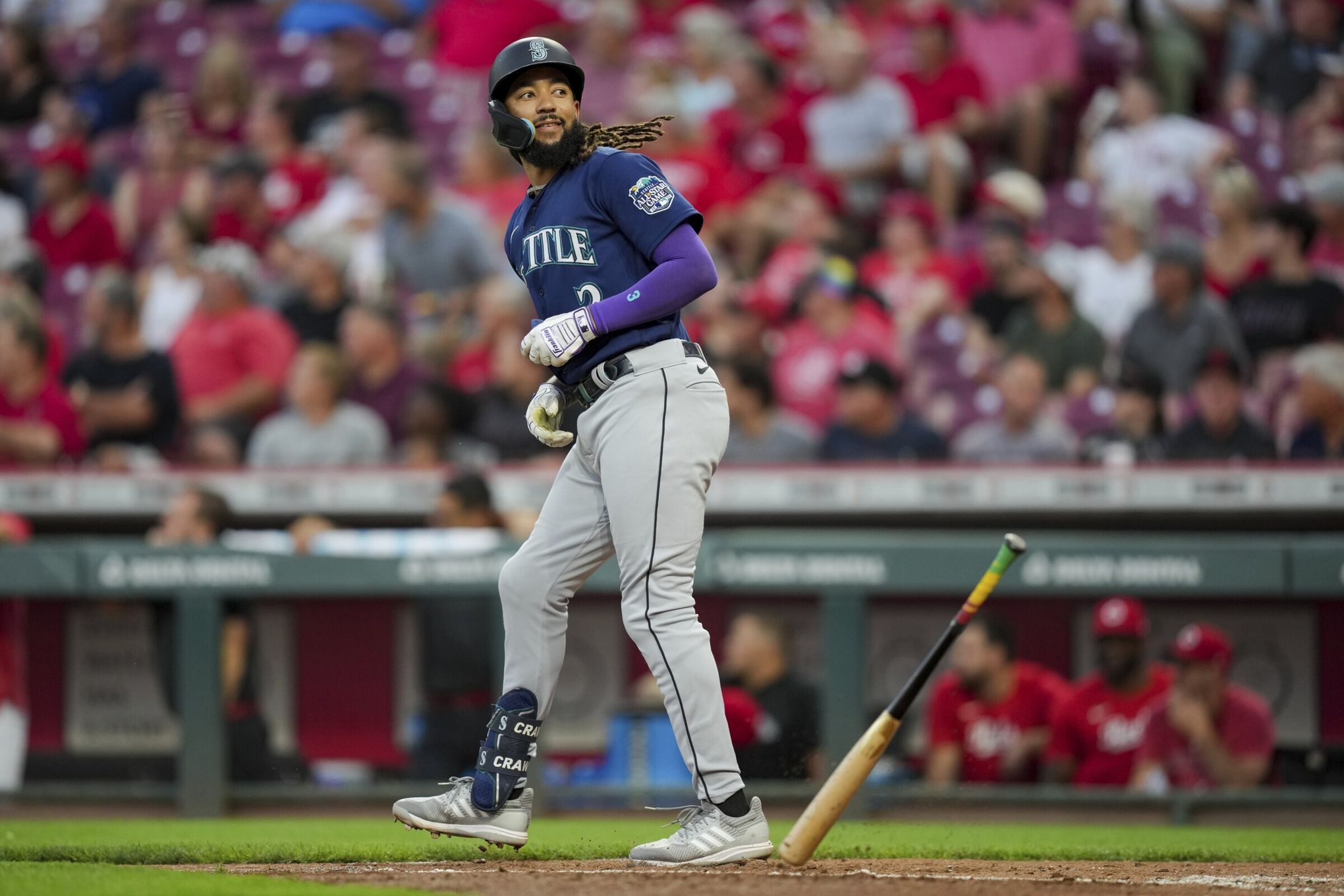 Seattle Mariners' J.P. Crawford holds a trident after hitting a solo home  run against the Oakland Athletics during the ninth inning of a baseball  game Tuesday, Sept. 19, 2023, in Oakland, Calif. (