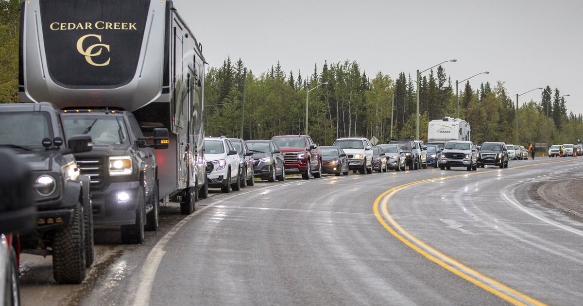 Evacuation order lifted for northern Canadian city after weeks of fire ...