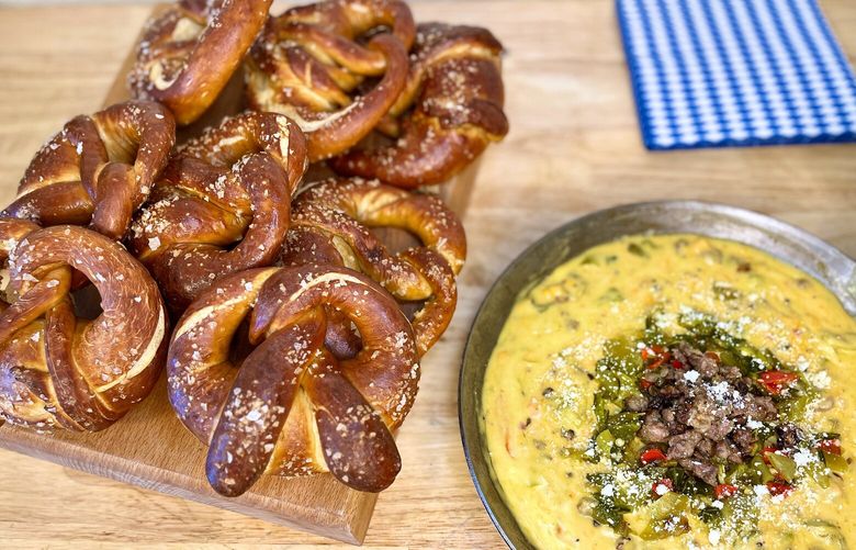 Celebrate Oktoberfest with Bavarian-style pretzels, which pair perfectly with bratwurst queso dip.