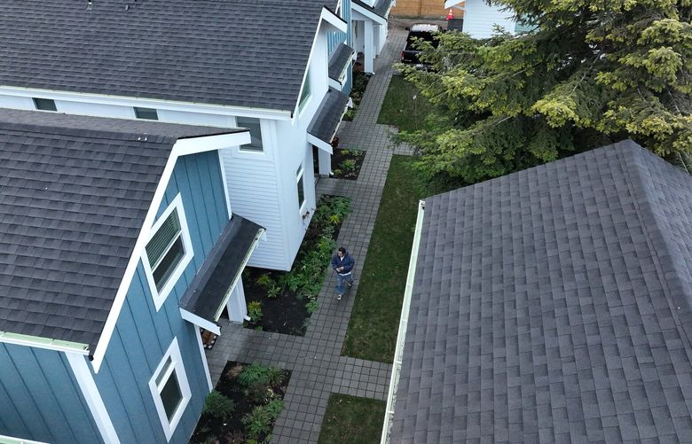 Habitat for Humanity’s recent project in Seattle’s South Park neighborhood replaced old house to become 13 affordable condo-cottages.