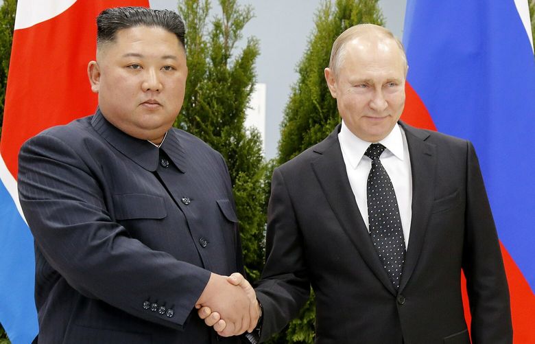 FILE – Russian President Vladimir Putin, right, and North Korea’s leader Kim Jong Un shake hands during their meeting in Vladivostok, Russia on April 25, 2019. (AP Photo/Alexander Zemlianichenko, Pool, File)