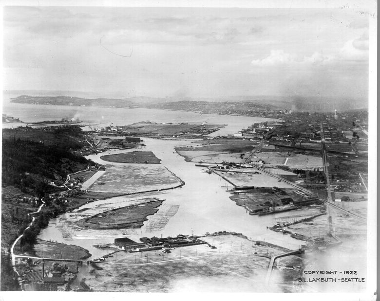 In 1922, the original meandering course of the Duwamish River was still visible after dredging opened up a straight, deepened waterway to create industrial land south of downtown Seattle. (Seattle Times Archives, 1922)