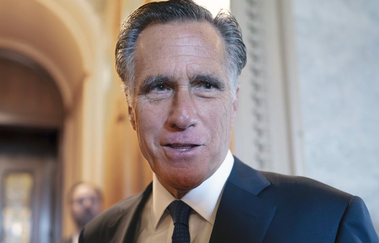 FILE – Sen. Mitt Romney, R-Utah, and other senators arrive at the chamber for votes, at the Capitol in Washington, Wednesday, Sept. 6, 2023. Romney will not run for reelection in 2024. The former presidential candidate and Massachusetts governor announced his intentions in a video statement Wednesday. (AP Photo/J. Scott Applewhite, File) DCSA121 DCSA121