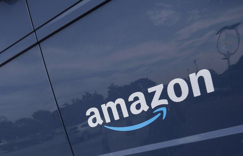 The company logo graces one of the doors of a delivery van for Amazon, Sept. 1, 2021, in Denver. Amazon said Wednesday, April 13, 2022 it will add a 5% “fuel and inflation surcharge” to fees it charges third-party sellers who use the retailer’s fulfillment services as the company faces rising costs. The company said in an announcement on its website that the added fees will take effect on April 28 and are subject to change. Federal data released Tuesday showed inflation hit 8.5% in March, its fastest pace in more than 40 years. (AP Photo/David Zalubowski, file) NYPS208