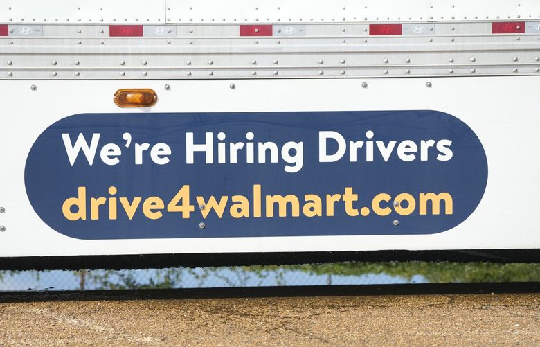 An ad for drivers is displayed on a Walmart truck in Richland, Miss., Wednesday, Sept. 6, 2023. On Thursday, the Labor Department reports on the number of people who applied for unemployment benefits last week. (AP Photo/Rogelio V. Solis) NYPM401 NYPM401
