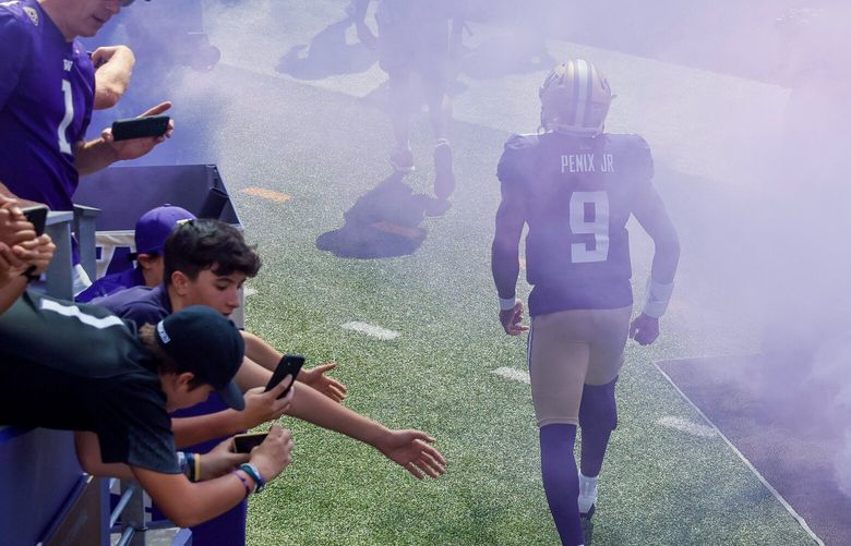 Washington Huskies quarterback Michael Penix Jr. comes out of the tunnel before the start of a game against the Boise State Broncos  Sept. 2 at Husky Stadium, in Seattle, WA. 224881