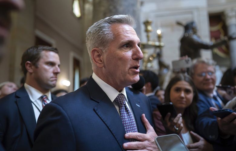Speaker of the House Kevin McCarthy, R-Calif., stops for reporters’ questions about passing a funding bill and avoiding a government shutdown, at the Capitol in Washington, Monday, Sept. 18, 2023. McCarthy is trying to win support from right-wing Republicans by including spending cuts and conservative proposals for border security and immigration. (AP Photo/J. Scott Applewhite) DCSA106 DCSA106
