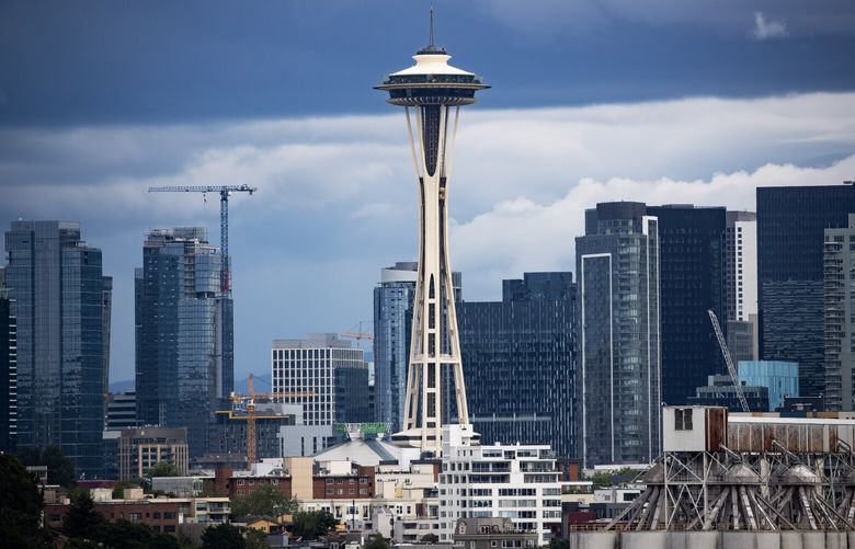 The Seattle Space Needle Sunday, June 18, 2023, after heavy rain in Seattle.
LO