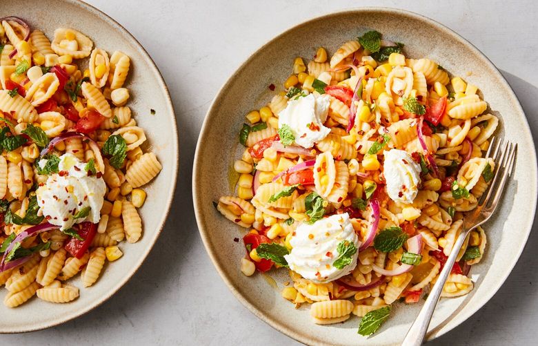 Pasta with corn, mint and red onions. A snap to throw together, this lively dish takes the best parts of pasta salad and makes them a whole lot better, Melissa Clark writes. Food styled by Barrett Washburne. (Linda Xiao/The New York Times)