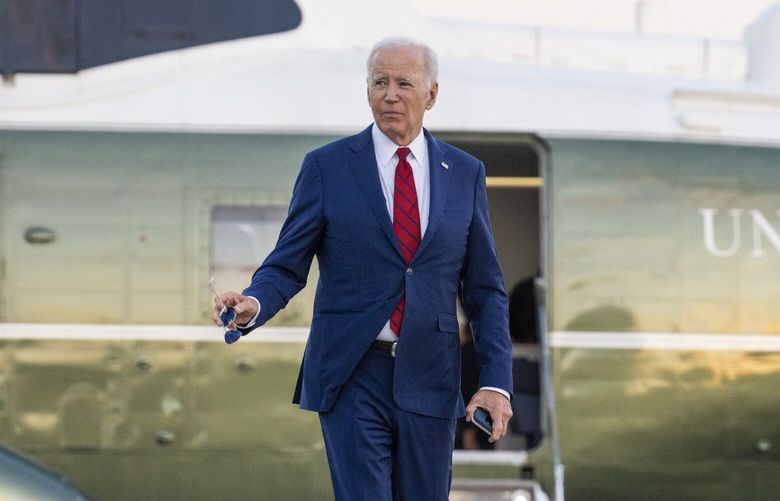 President Joe Biden walks off Marine One with second gentlemen Doug Emhoff as they walk to Air Force One and depart JFK Airport in New York, on Wednesday, Sept. 20, 2023. How to deal with the border is at the heart of the funding debate in Congress, and is certain to be central to the debate between President Biden and his Republican opponent in the 2024 campaign next year. (Doug Mills/The New York Times) XNYT0042 XNYT0042