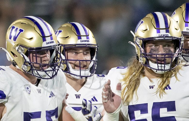 Ferndale brothers Geirean (56) and Landen Hatchett (66) shared a UW offensive line for the first time in last weekend’s 41-7 win at Michigan State.