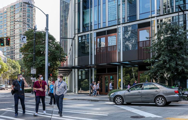 Officers workers and tourists on the streets of the South Lake Union business district in Seattle, Washington on August 25, 2023.
224834