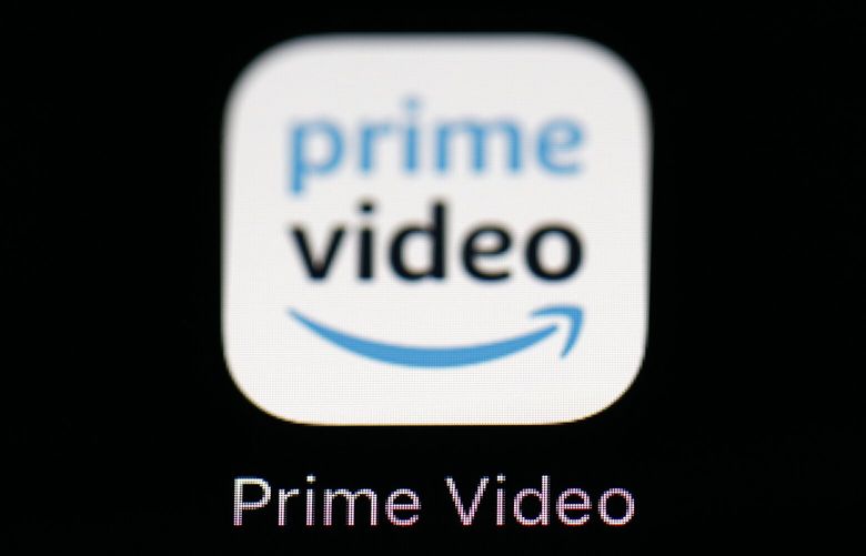 FILE – Amazon’s Prime Video streaming app on an iPad is seen in Baltimore on March 19, 2018. Amazon says that it will now start charging $2.99 per month in order for users in the U.S. to watch Prime Video ad free. (AP Photo/Patrick Semansky, File) TKSJ103 TKSJ103