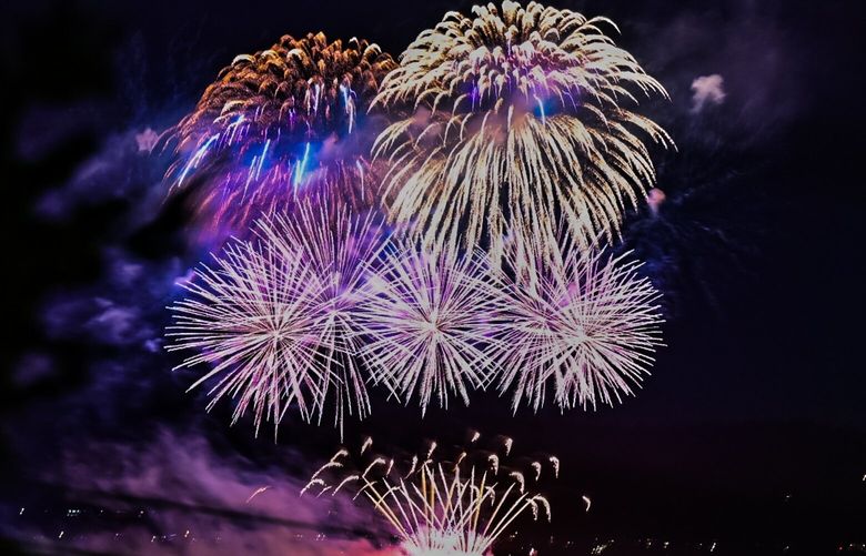 A private fireworks show set from a barge is seen from West Seattle across the Puget Sound on Saturday, Sept. 16, 2023, in Seattle. As the fireworks roared over the Puget Sound, the show caught off guard many Seattleites on Saturday evening.