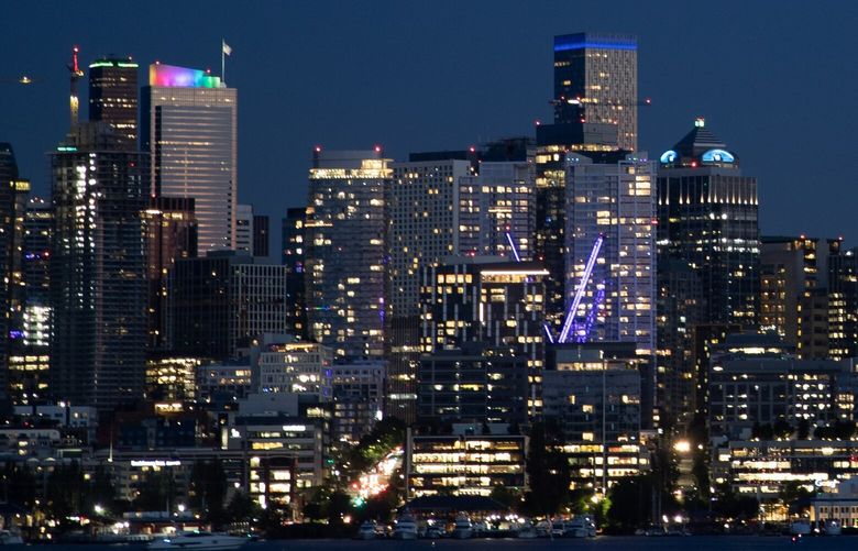 The city skyline at night from Gas Works Park Saturday, June 24, 2023, in Seattle.
LO