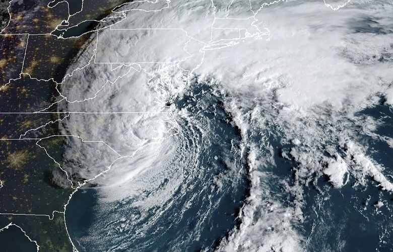 This Saturday, Sept. 23, 2023, 8:16 am EST satellite image provided by the National Oceanic and Atmospheric Administration shows Tropical Storm Ophelia making landfall in North Carolina. (NOAA via AP) NY107 NY107