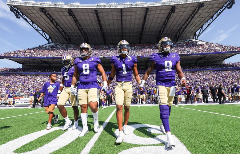 Washington’s captains come out for the coin toss.
The Boise State University Broncos played the Washington Huskies in the season opener for both teams Saturday, Sept. 2, 2023 at Husky Stadium, in Seattle, WA. 224855