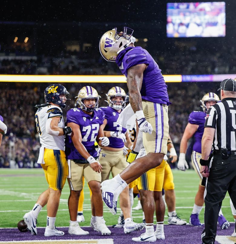 Dillon Johnson scores in the second quarter for Washington Huskies against Cal Bears, Saturday, at Husky Stadium, in Seattle. (Dean Rutz / The Seattle Times)