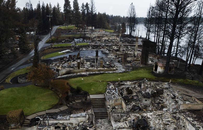 Homes were razed by the Gray Fire on the western shore of Silver Lake on Aug. 31, 2023.