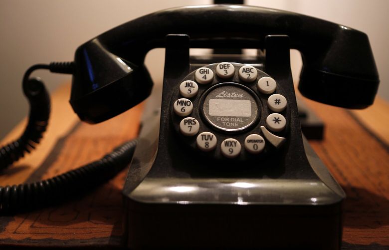 FILE – This Wednesday, April 14, 2016, file photo, shows a push-button landline telephone, in Whitefield, Maine. According to a U.S. government survey released Thursday, May 4, 2017, homes and apartments with only cellphone service exceeded 50 percent for the first time, reaching 50.8 percent for the last six months of 2016. On the flip side, 45.9 percent of U.S. households still have landline phones, including newer internet-based services common with cable TV and internet packages, while the remaining households have no phone service at all. More than 39 percent of U.S. households have both landline and cellphone service. (AP Photo/Robert F. Bukaty, File) NYBZ442