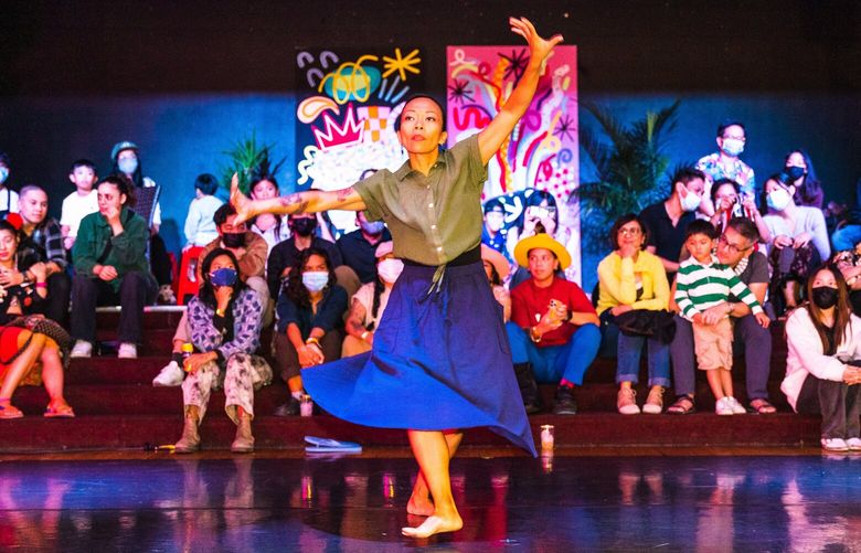 Dancer Prasti Purdum performs an excerpt of Filipino American choreographer Bennyroyce Royon’s “Homebound/Alaala” for the 2022 Palengke at Filipino Community of Seattle.