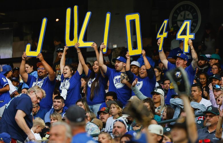 Fans along the third base foul line turn out for Julio Rodriguez before Saturday’s game with the Dodgers.  The Los Angeles Dodgers played the Seattle Mariners in Major League Baseball Saturday, Sept. 16, 2023 at T-Mobile Park, in Seattle, WA. 224974