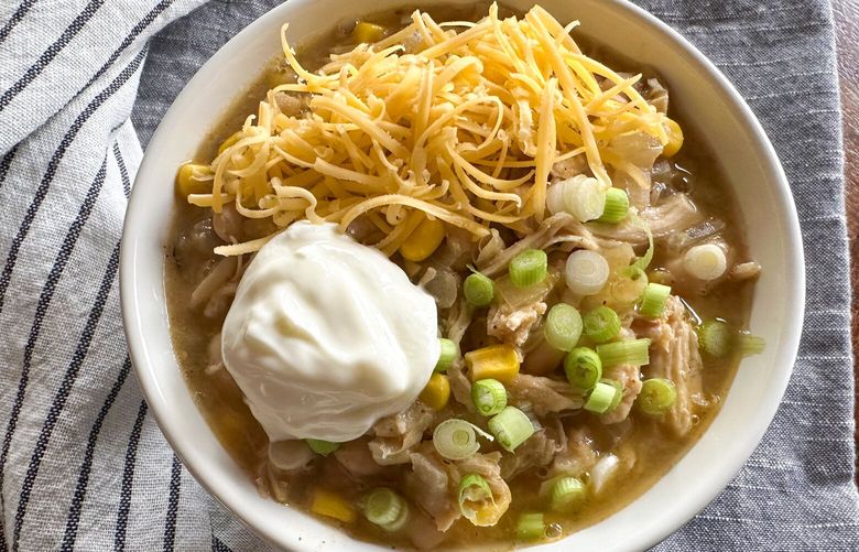 This easy white chicken chili recipe makes smart use of “processed” ingredients and tastes great the next day.