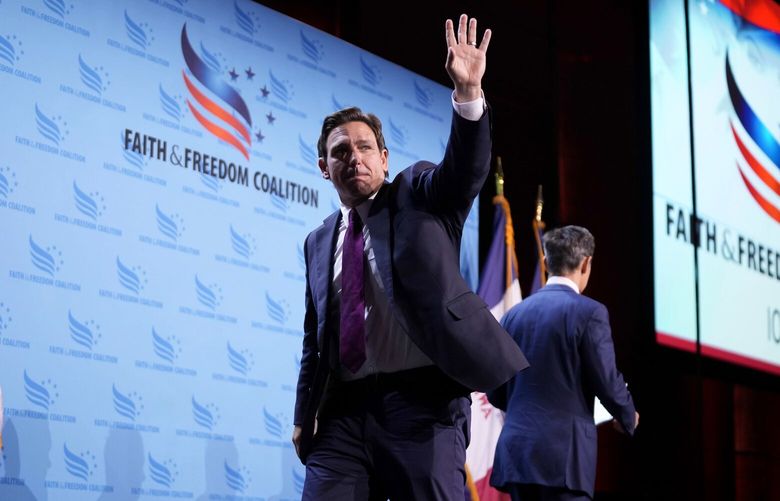Republican presidential candidate Florida Gov. Ron DeSantis waves to the crowd at the Iowa Faith & Freedom Coalition’s fall banquet, Saturday, Sept. 16, 2023, in Des Moines, Iowa. (AP Photo/Bryon Houlgrave) IABH189 IABH189