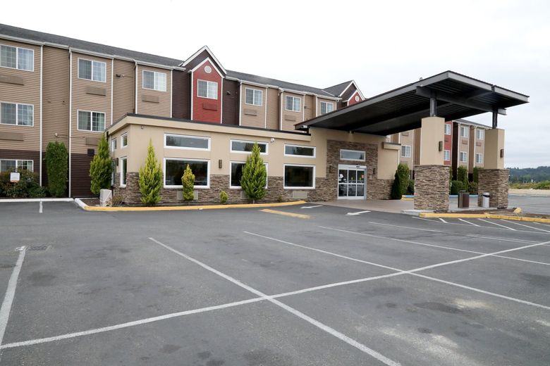 The Clarion Inn in Auburn was purchased by the county to house homeless people. (Greg Gilbert / The Seattle Times, 2021)