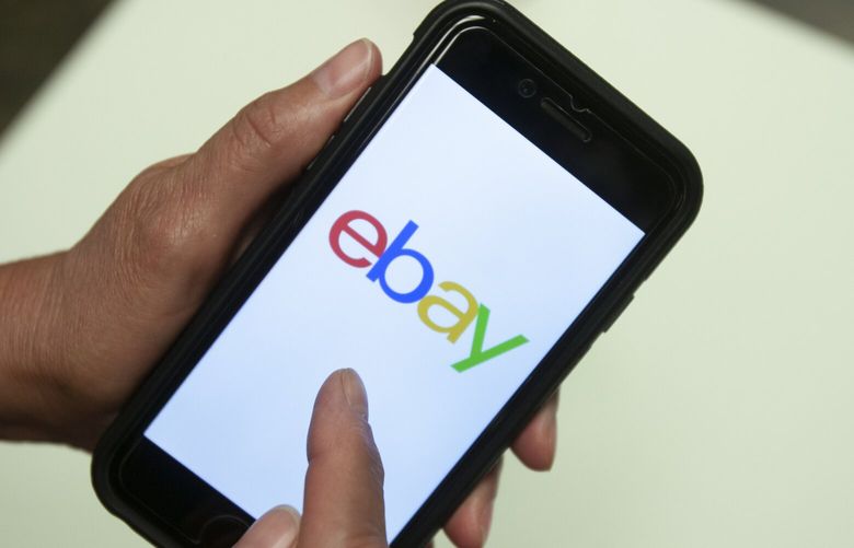 FILE – An eBay app is shown on a mobile phone, July 11, 2019, in Miami. On Wednesday, Sept. 27, 2023, the U.S. Justice Department filed a civil complaint against eBay, claiming the online company unlawfully sold and distributed hundreds of thousands of products that violated various environmental laws. (AP Photo/Wilfredo Lee, File) NYSS301 NYSS301