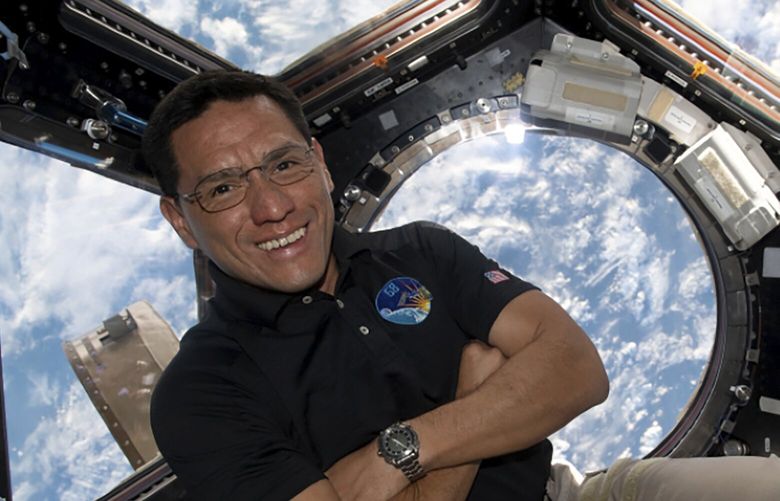 This image provided by NASA shows astronaut Frank Rubio floating inside the cupola, the International Space Station’s “window to the world.” Rubio now holds the record for the longest U.S. spaceflight. Rubio surpassed the U.S. record of 355 days on Monday, Sept. 11, 2023 at the International Space Station. He arrived at the outpost last September with two Russians for a routine six months. (NASA via AP) NYPS207 NYPS207