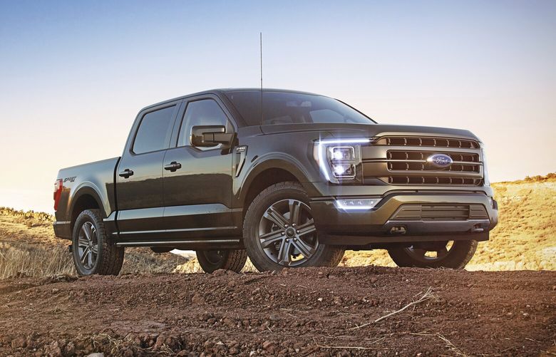 This photo provided by Ford shows the 2023 F-150. The truck’s available PowerBoost hybrid powertrain makes 430 horsepower and can get up to an EPA-estimated 25 mpg. (Courtesy of Ford Motor Co. via AP) 