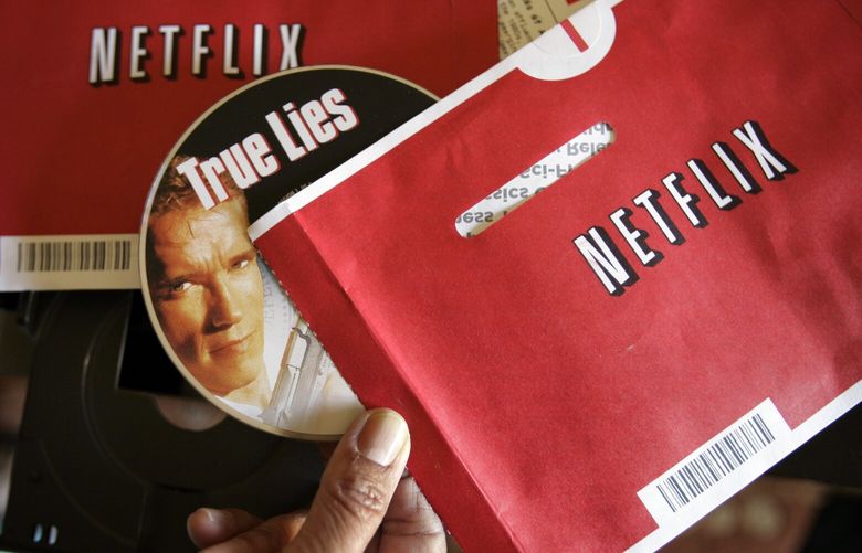 The Netflix DVD-by-service will mail out its final discs Friday from its five remaining distribution centers, ending its 25-year history. (AP Photo/Paul Sakuma, 2007) 