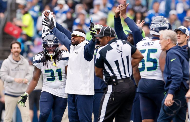 Seattle Seahawks safety Jamal Adams, in sunglasses, questions a pass interference call during the third quarter Sunday, Sept. 24, 2023 in Seattle. 225054
