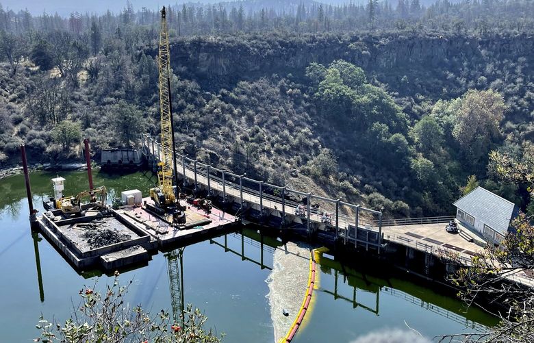 A view shows the Copco 1 Dam in Hornbrook, Calif., Sunday, Sept. 17, 2023. The dam is one of a series of four dams along the Klamath River which are part of the largest dam removal project in United States history. Now underway along the Oregon border, the process won’t conclude until the end of next year with the help of heavy machinery and explosives. (AP Photo/Haven Daley) RPHD503 RPHD503